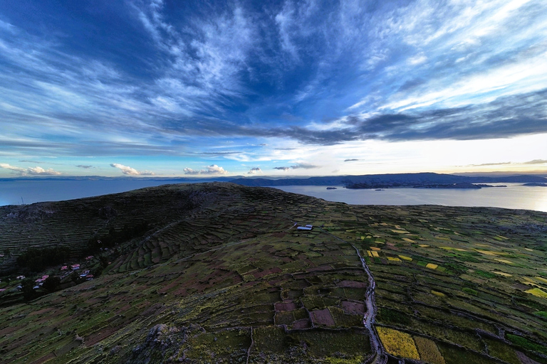 From Puno: Lake Titicaca 2-Day Tour with Homestay From Puno: 2-Day Guided Tour with Fixed Pickup Point