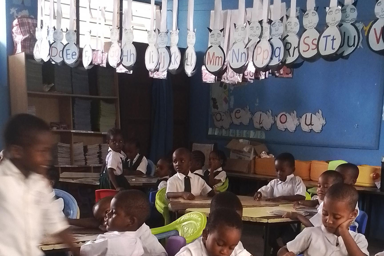 Zanzibar: Stone Town Tour and School Visit with Hassan Discover Town and School Visit with Hassan