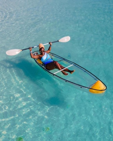 Visit kendwa beach; A transparent clear kayak in Nungwi, Zanzibar, Tanzania