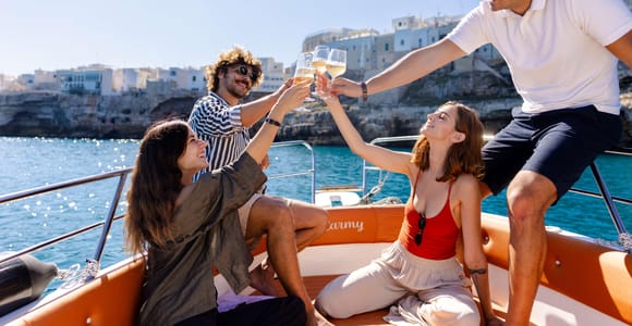 Polignano by Boat: Caves, Swimming and a Break with Prosecco and Local Specialties