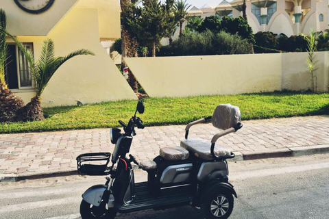 Djerba in Electric Mode: 3 Wheels, 3 Adventurers, Ready to Explore the Island? Djerba: Electric 3-Wheeler Ride for a Fun Family Experience