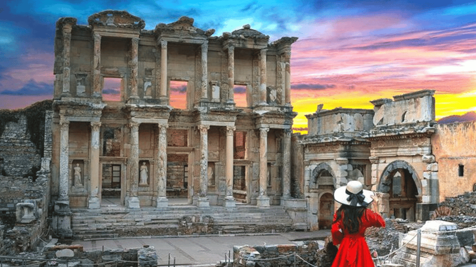 Marble columns and ancient paving at Ephesus beneath a clear Aegean sky