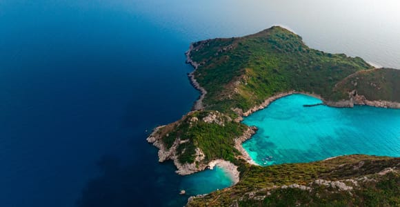 Porto Timoni & Kastelli Bay and Caves Cruise with Swim Stops