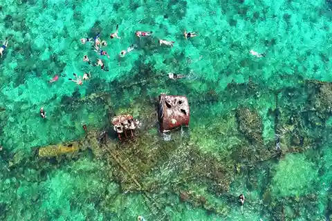 Roatan 3 Stops Snorkeling: Shipwreck, Starfish, Blue Channel