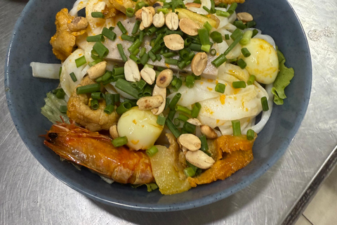 Tour panoramico della città di Da Nang con avventura in parapendioTour privato in moto