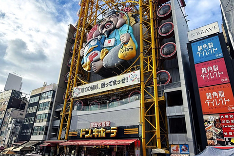Osaka: Dotonbori Night Cruise, Takoyaki & Izakaya Tour