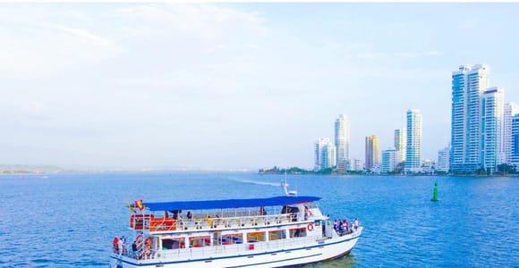 CARTAGENA: Chiva City Tour + Sunset Boat Ride in the Bay with an Open Bar!