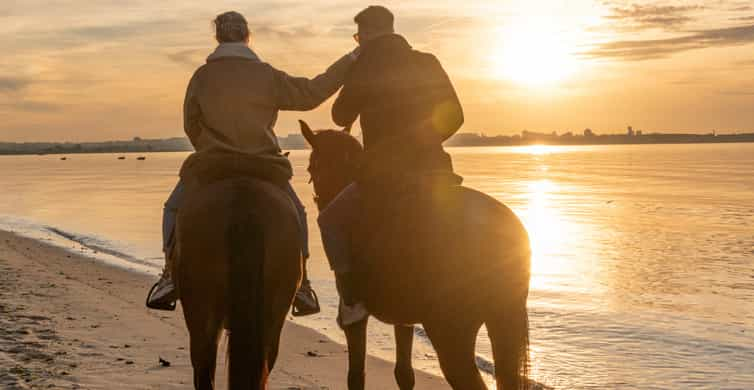 Horseback Riding on the Beach at Sunset