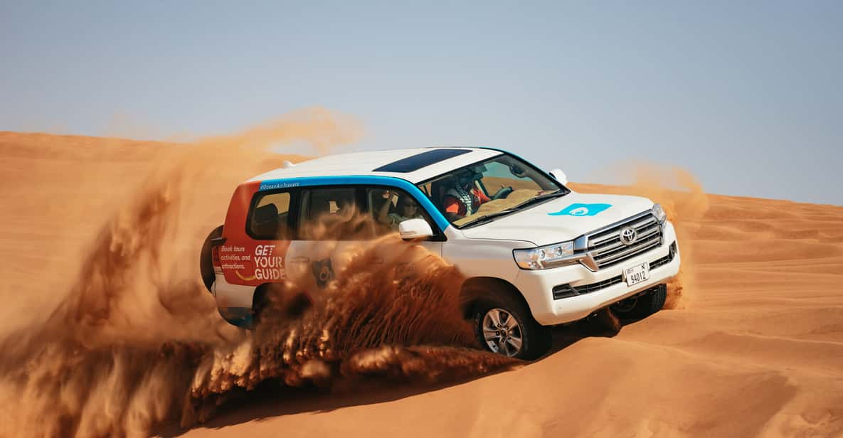 Dubai: Half-Day Desert Safari, Camel Ride & Quad Bike Option | GetYourGuide