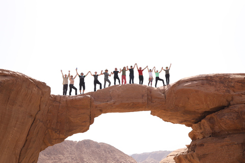 From Wadi Rum: Hike a Mountain with Guide & Stay (optional) Burdah Rock Bridge Mountain Day & Free Lunch Only