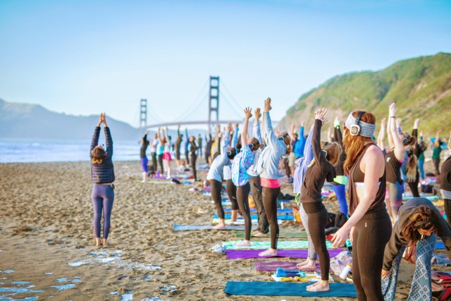 Visit San Francisco Silent Disco Yoga at Baker Beach in San Francisco
