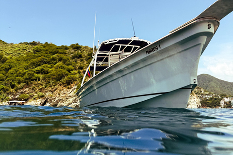 Explore local beaches in Santa Marta with snorkeling and lunch Tour of local beaches in Santa Marta with snorkeling and lunch