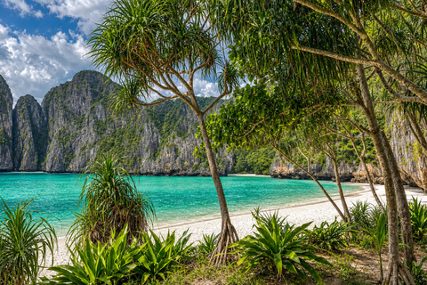 From Phi Phi: Iconic Bays by Longtail—Beach, Lagoon, Snorkel Phi Phi: Longtail Join Trip — Bays, Beach & Snorkeling