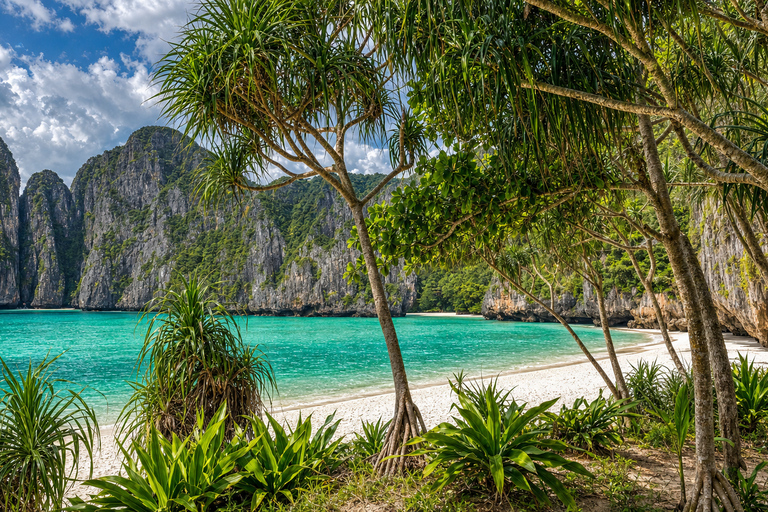 From Phi Phi: Iconic Bays by Longtail—Beach, Lagoon, Snorkel Phi Phi: Longtail Join Trip — Bays, Beach & Snorkeling