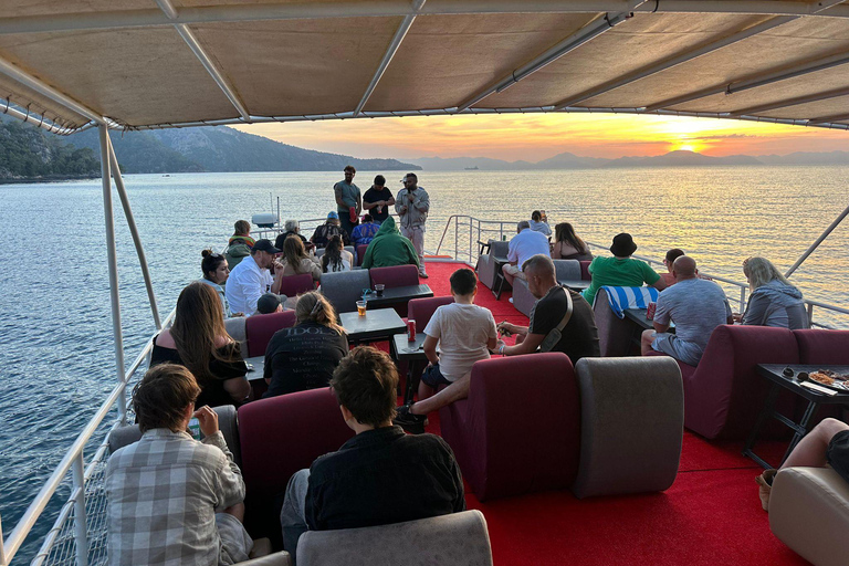 Fethiye Sunset Cruise with Dinner, Swimming Break, and Entertainment Fethiye Sunset Dinner Cruise with Swimming Break and Entertainment