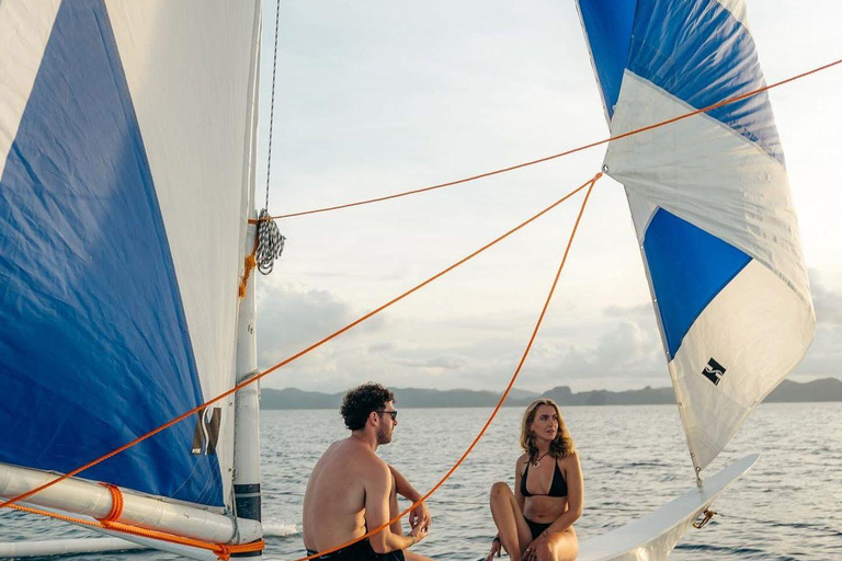El Nido: Private Falls, Surf & Sunset Sailing Experience