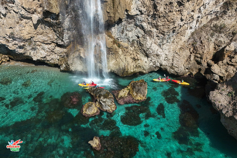 Nerja: Self-Guided Kayak Tour. Maro Waterfall. Support boat for the route.