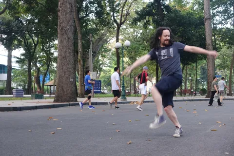 Private Saigon Morning Exercise-Drink Bird Coffee-City Tour