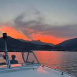 Aperitivo al tramonto in barca sul lago d'Iseo