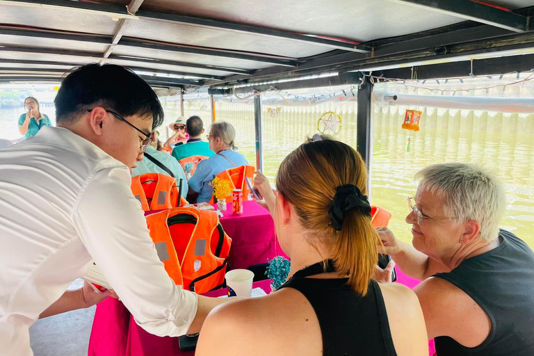 1 hour Nhieu Loc boat tour experience: A Glimpse of Saigon Releasing Fish