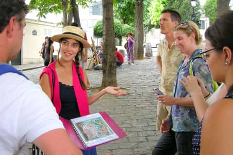 Night view over Paris and Montmartre streets near Moulin Rouge