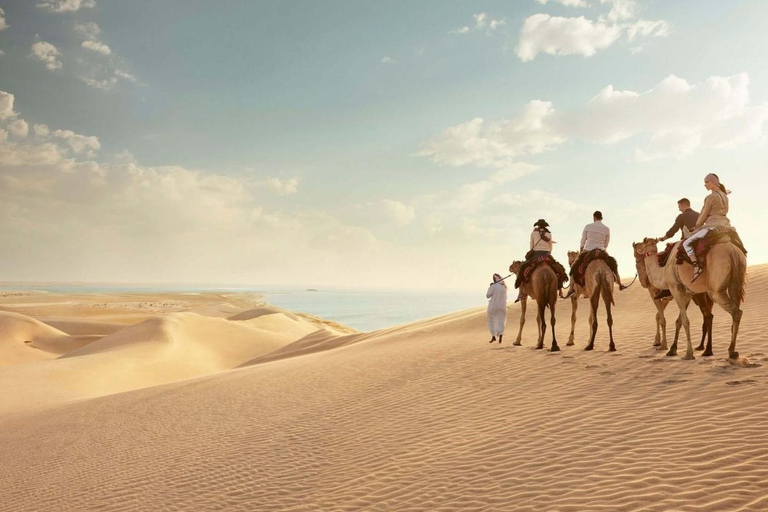 Doha: Safari económico por el desierto, paseo en camello y sandboarding