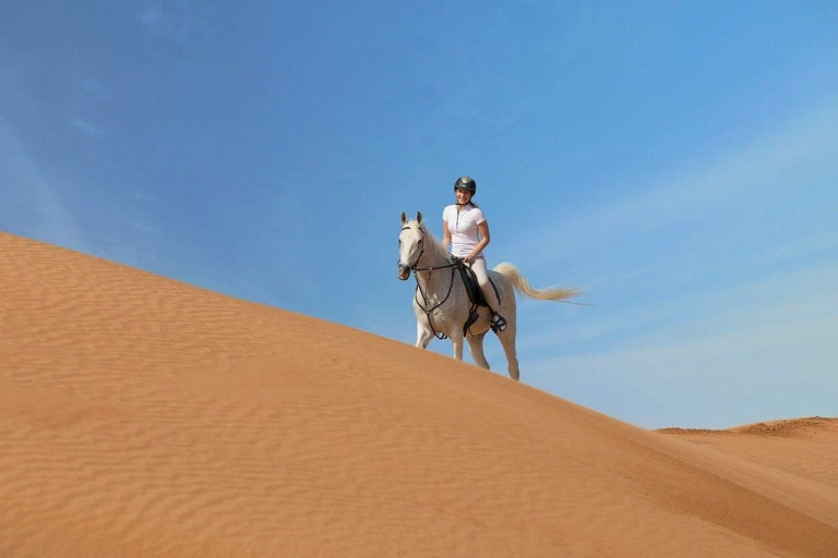 Ervaar paardrijden in de woestijn van Qatar