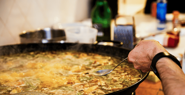 Valencia: Cook your paella (with a purchase at the Russafa market)
