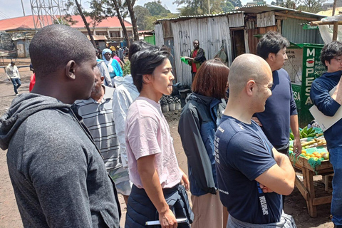 Nairobi: Tour a piedi della città del cioccolato e della baraccopoli di Kibera