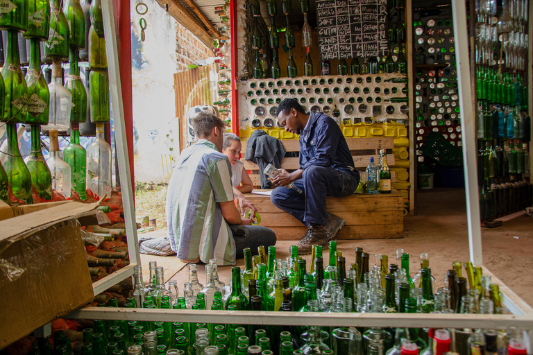 Kampala: Glassblowing, Beadmaking, and More Art Experience Blowing Glass Bubbles