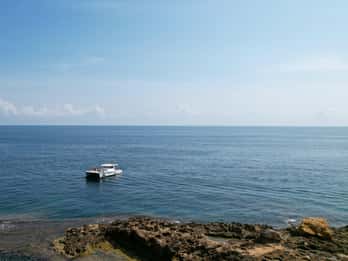 Altea: Motor catamaran with optional lunch and swimming stop
