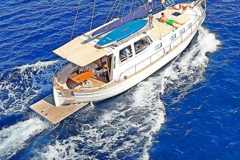 Palma: Private Classic Mallorcan Boat Tou Palma Bay: Cruise to Sea Caves or Calas with tapas & drinks
