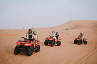 Dubai, Red Dune Desert Safari, Quad Bike, Camels, and BBQ - Housity