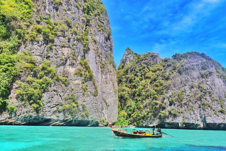 From Phi Phi: Full day Phi Phi Island tour by speed boat.