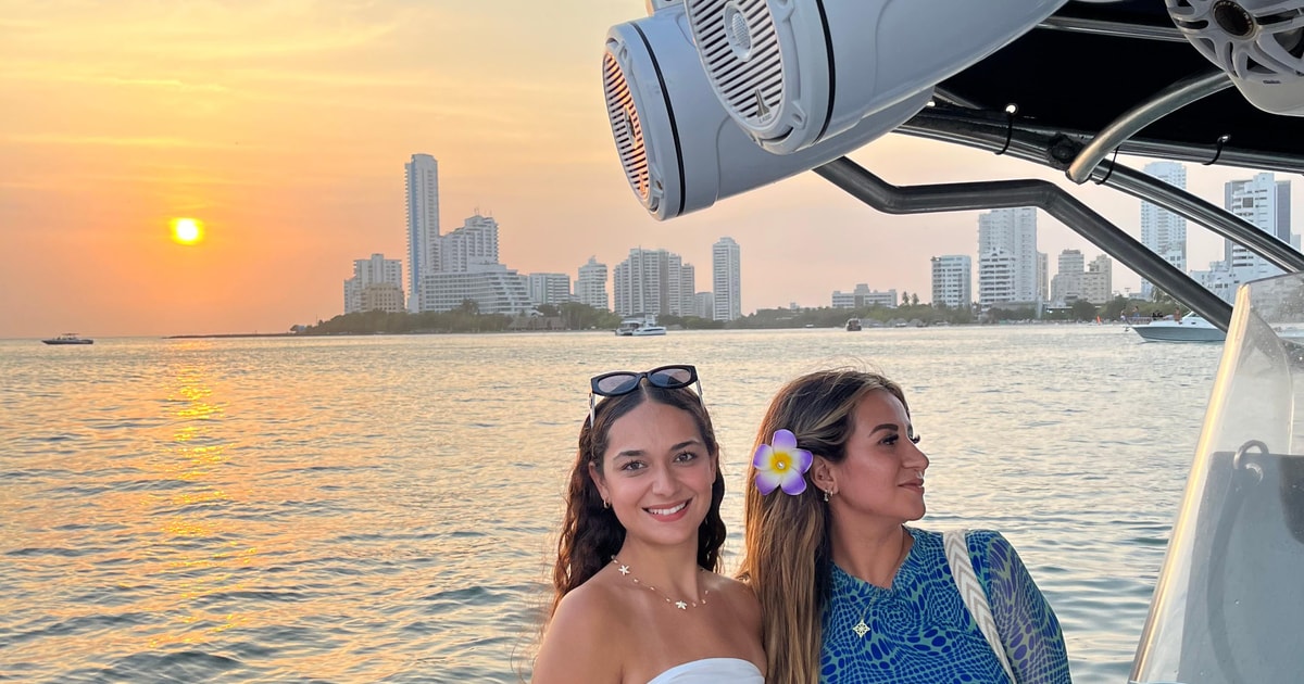 Sunset Party open bar on the bay while sharing with locals | GetYourGuide