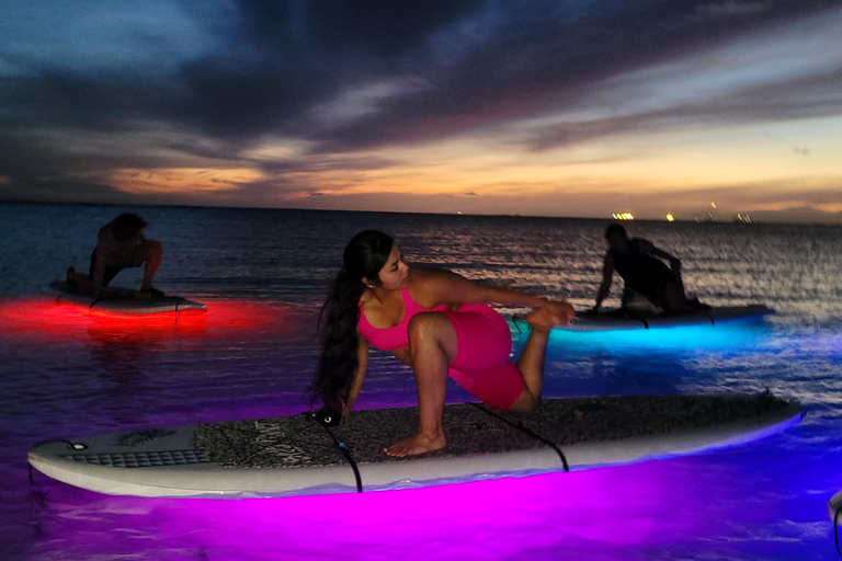 Honolulu: Night SUP Yoga Class