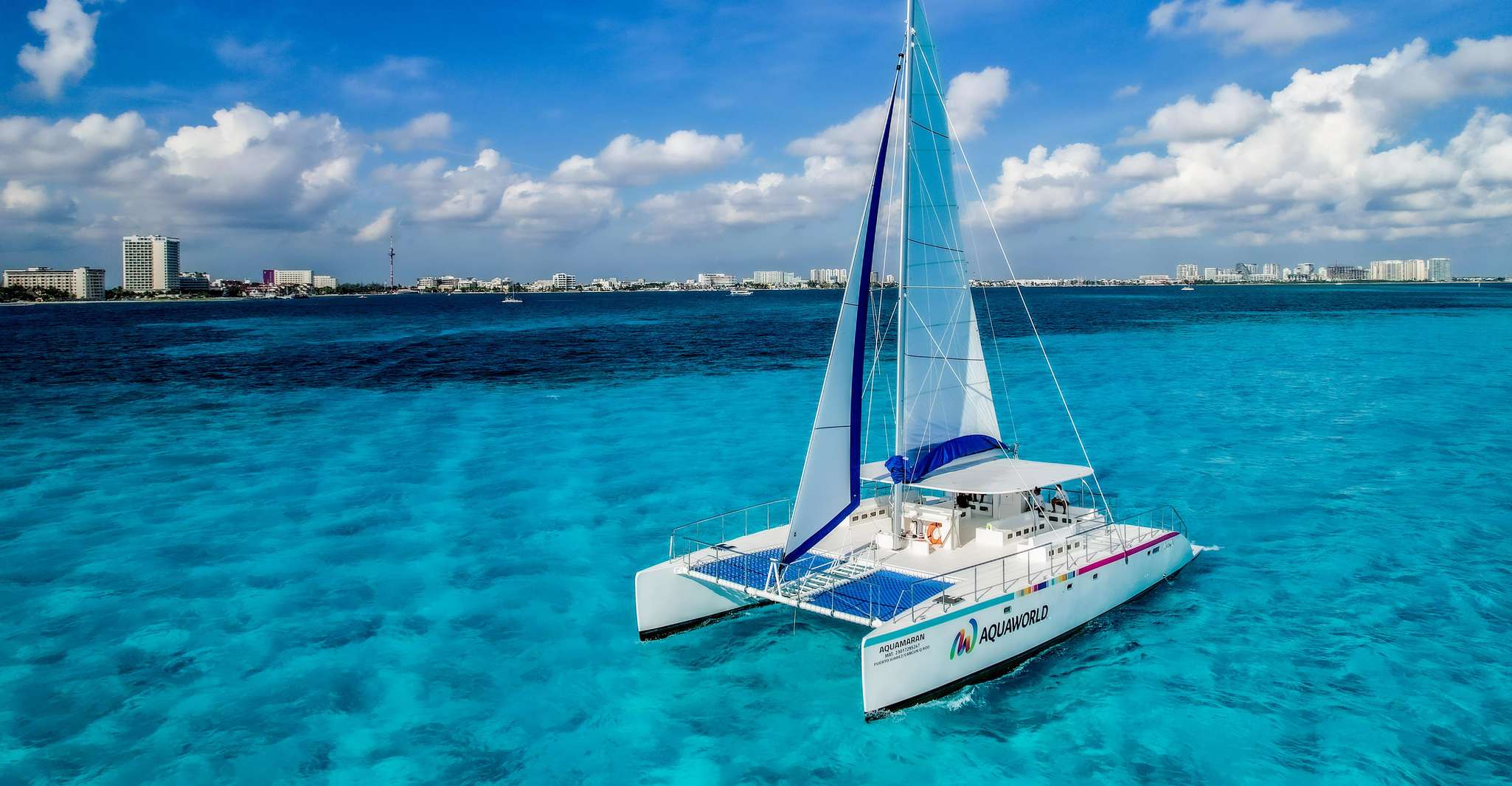 Isla Mujeres, Catamaran with Open Bar, Snorkeling and Lunch - Housity