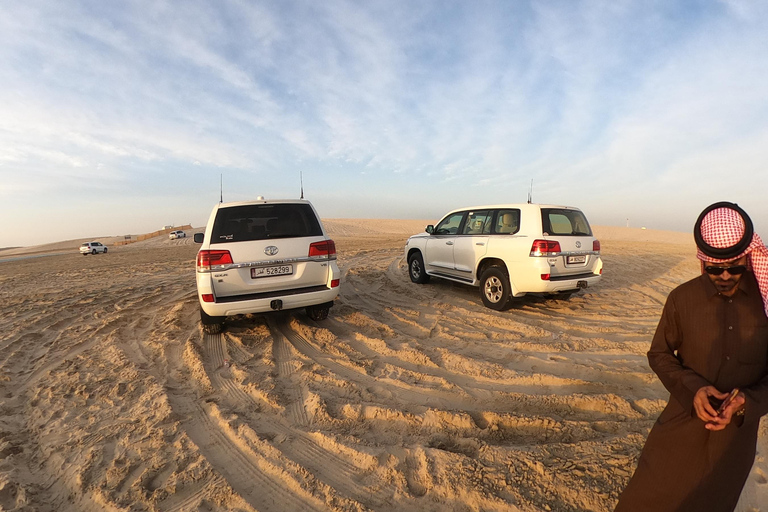 From Doha Airport Half Day Desert Safari with Camel Ride