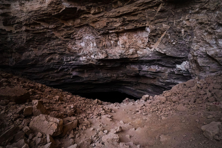 Caverna Heet e dunas de areia vermelha