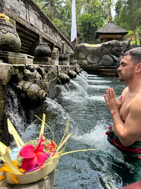 HOLY BATH IN TIRTA EMPUL TEMPLE | GetYourGuide