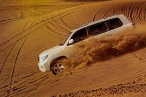 Doha: Woestijnsafari, quad, kamelentocht & sandboardenDoha: woestijnsafari, kameelrit door de duinen, sandboard-tour