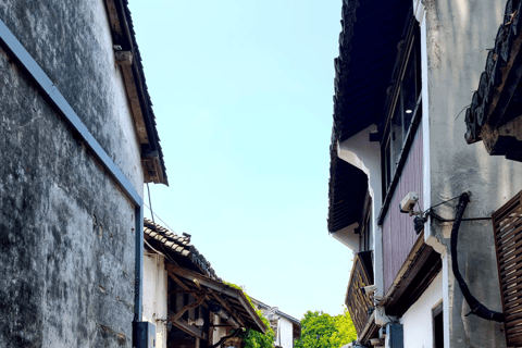 Shanghai Zhouzhuang Water Town Guided Tour with Free Time