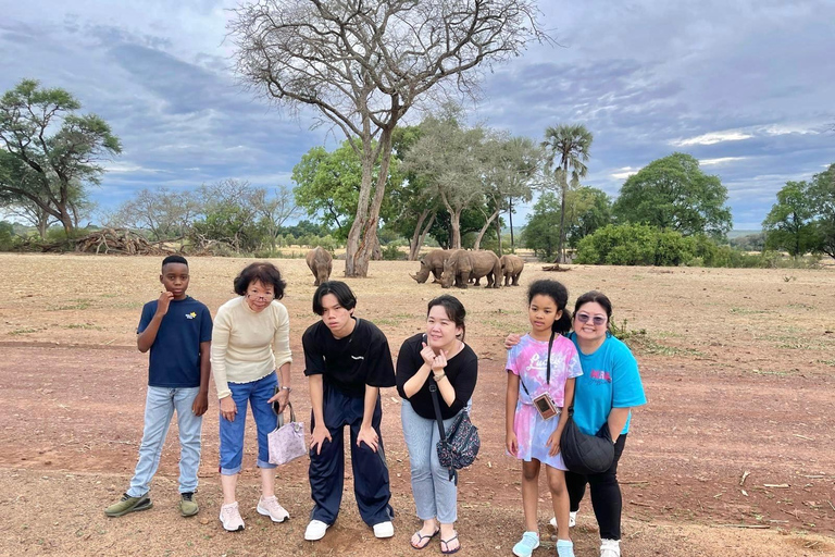 Livingstone: Rhino Walk, Victoria Falls &Mukuni Village Tour