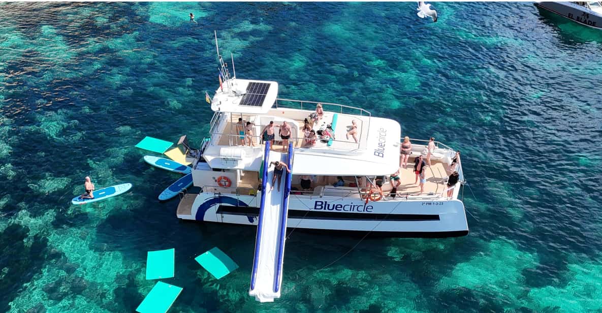 Palma: Deluxe Catamaran with Snacks, Drink, SUP & Snorkeling — a boat tour from Palma de Mallorca, Spain