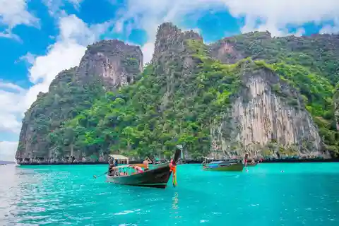 From Phi Phi islands: Phi Phi, Maya Area by longtail Boat