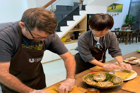 Clase de cocina Bay Mau con Ha Noi Phở en una casa local