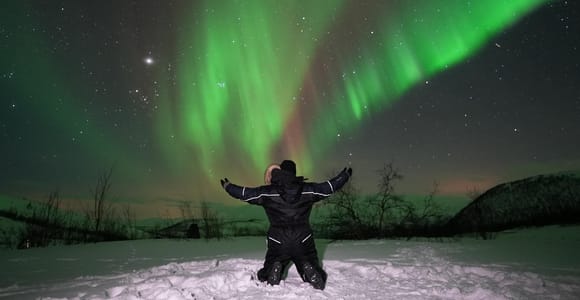 From Tromsø: Northern Lights Tour in Minibus with Photos