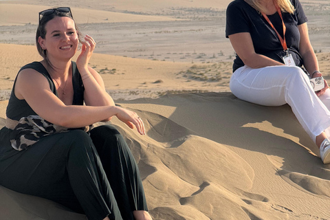 Doha: inland sea Tour With Dune Bashing &Sandboarding fun Doha: safari , camel ride, sandboarding hotel pickup