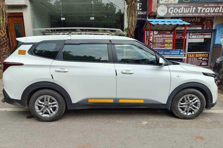 Dagsutflykt till Taj Mahal i en SUV-bil med alternativ.Dagsutflykt till Taj Mahal i en SUV-bil + guide