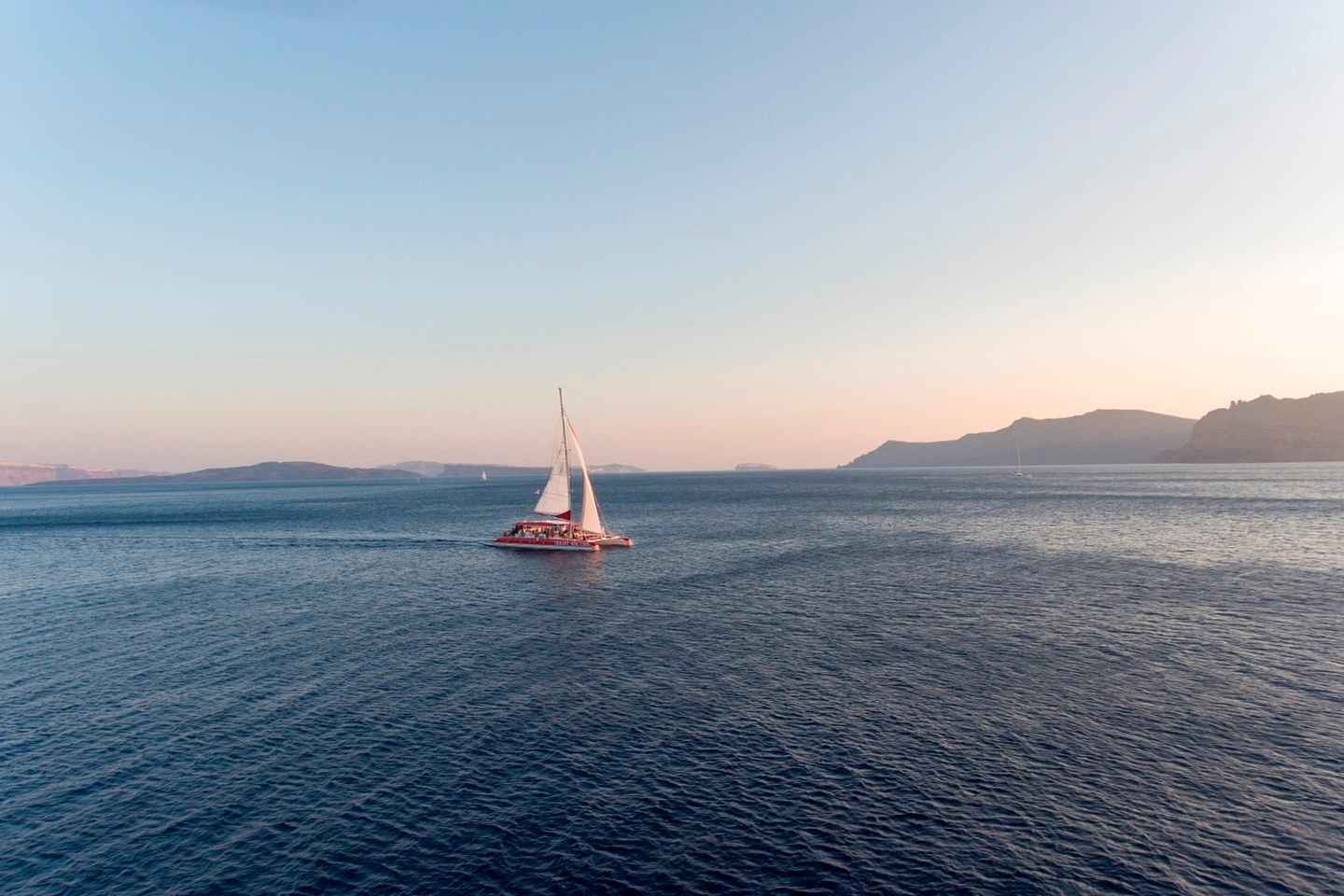 Santorini: Cruise Catamaran with BBQ & Drinks Day or Sunset